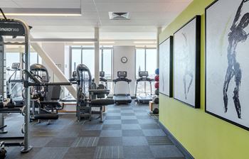 Spacious fitness center with great views, a wide range of equipment and private yoga studio
